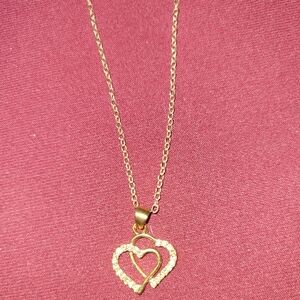 Intertwining Gold Hearts Pendant necklace
